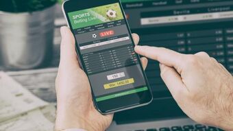 Football gambling online smartphone laptop 0