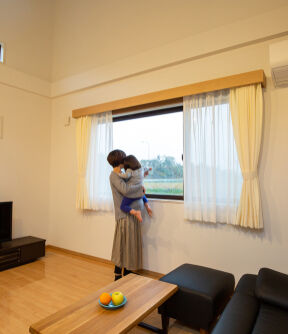 Woman looking out of window