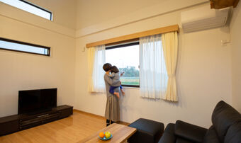 Woman looking out of window