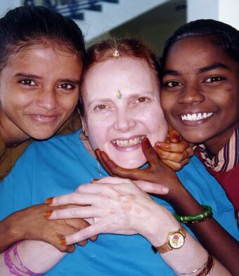 Alison Davis in 2002 with two of the children who gave her a reason to live 2