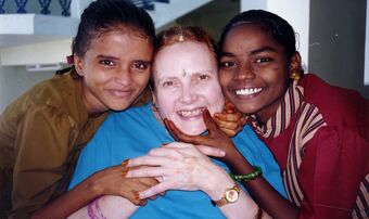 Alison Davis in 2002 with two of the children who gave her a reason to live 2