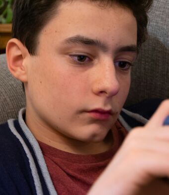 Teenage boy on phone