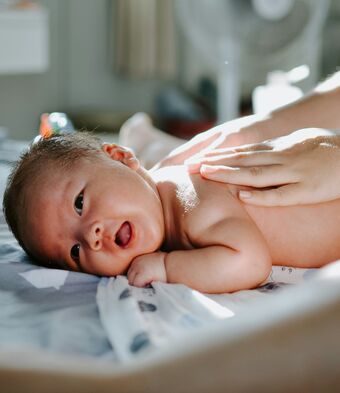 Baby on hospital bed
