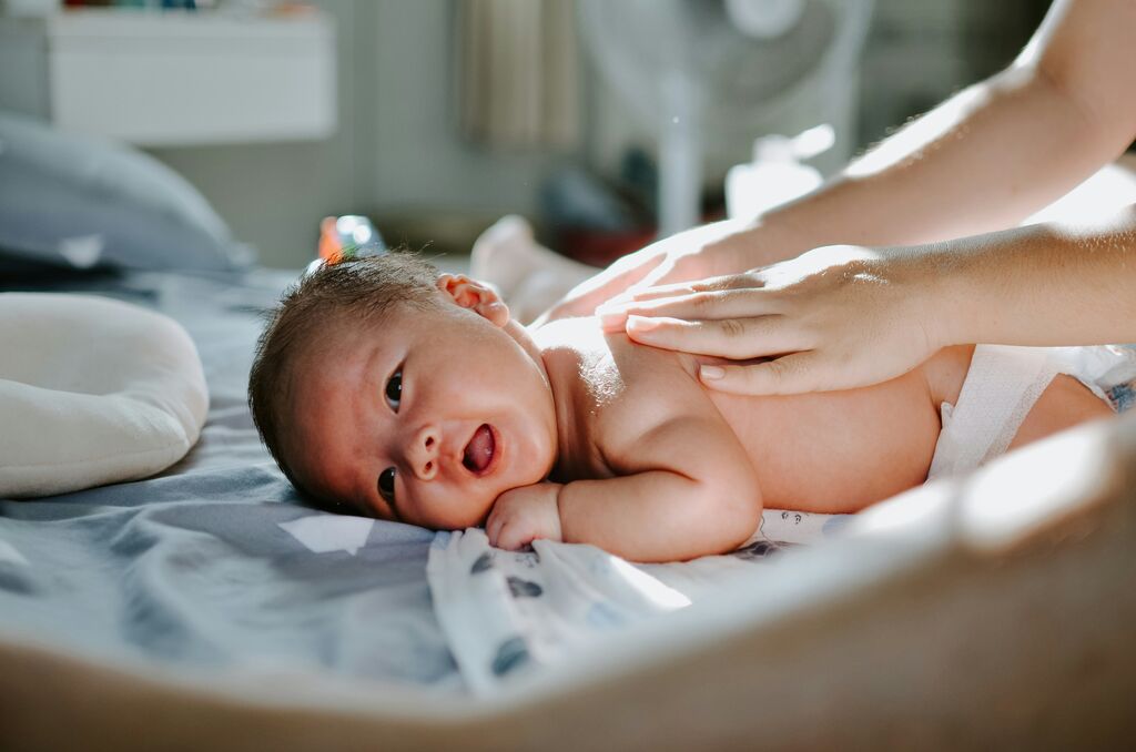 Baby on hospital bed