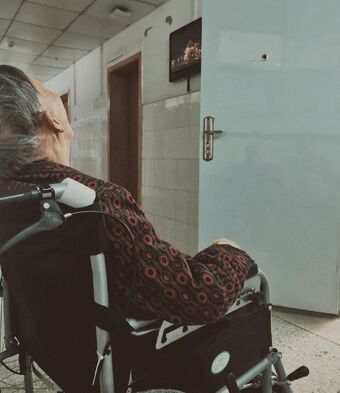 Elderly man in wheelchair
