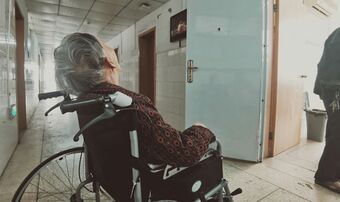 Elderly man in wheelchair