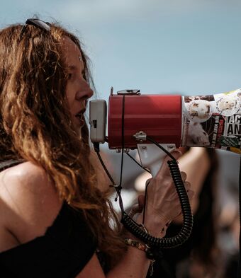 Young woman with megaphone