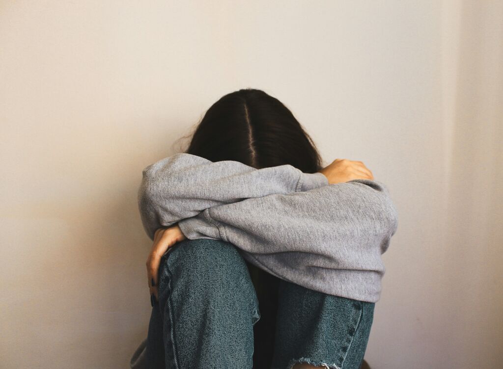 Woman head in hands