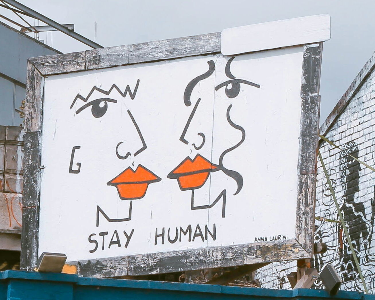 Stay Human Two Faces