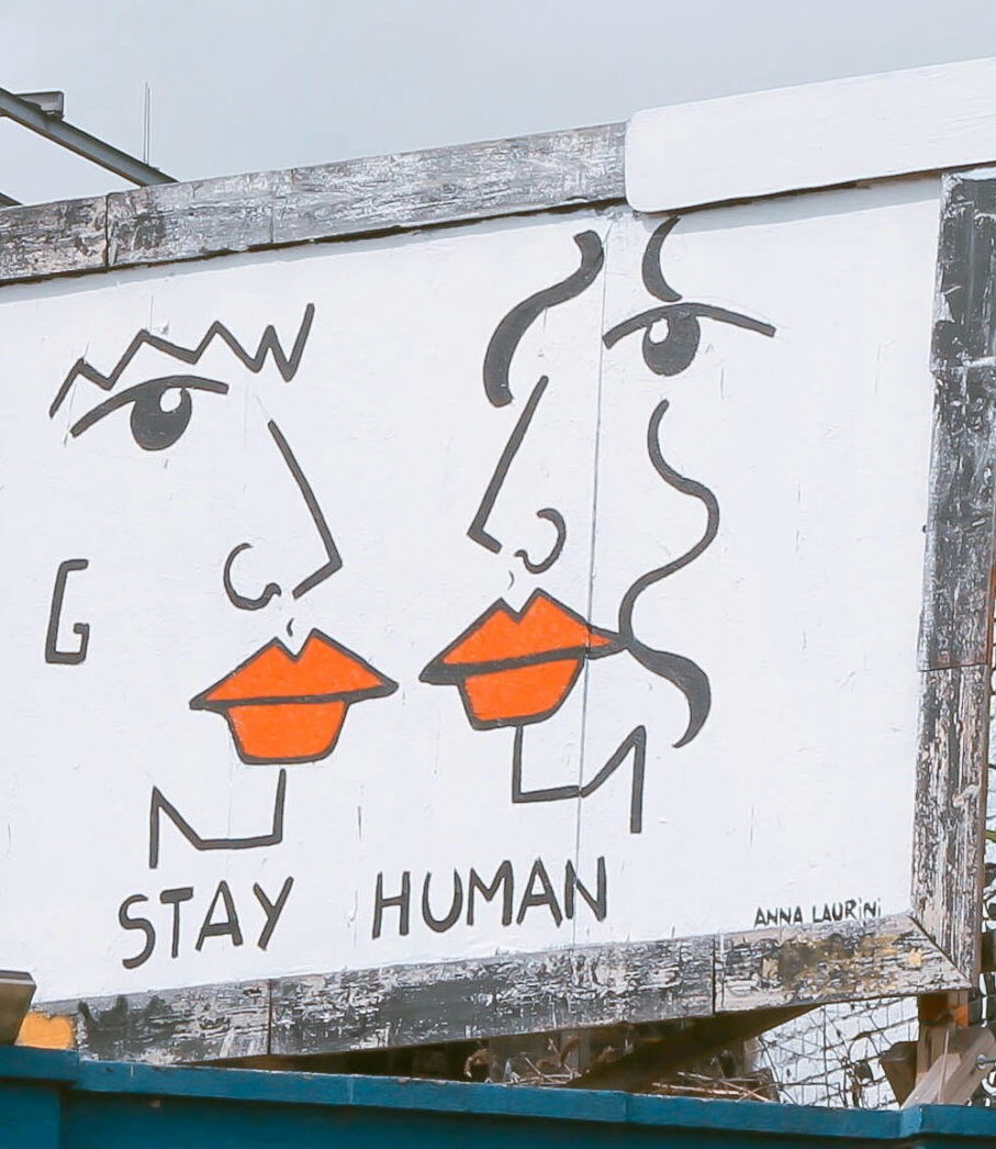 Stay Human Two Faces
