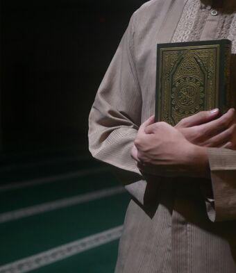 Muslim with quran