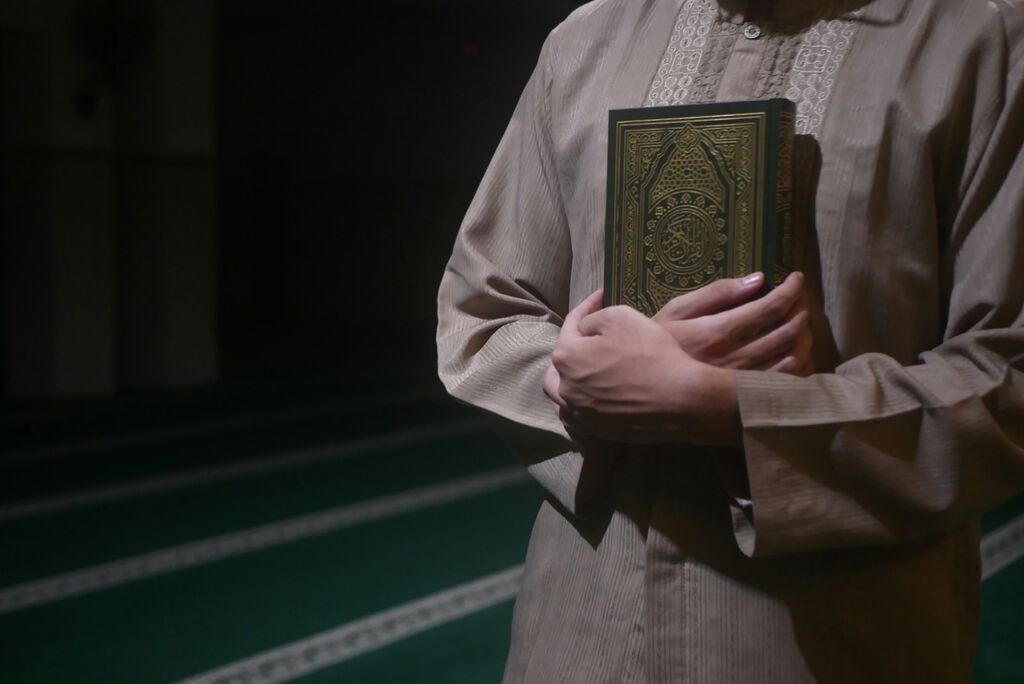 Muslim with quran