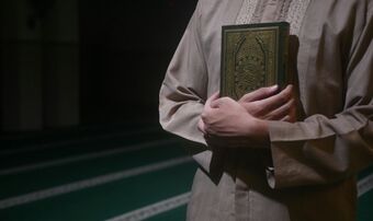 Muslim with quran