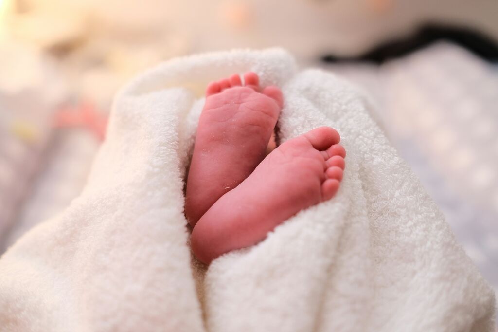 Newborn baby feet