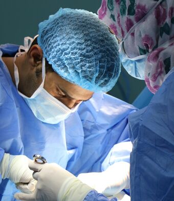Surgeon performing operation