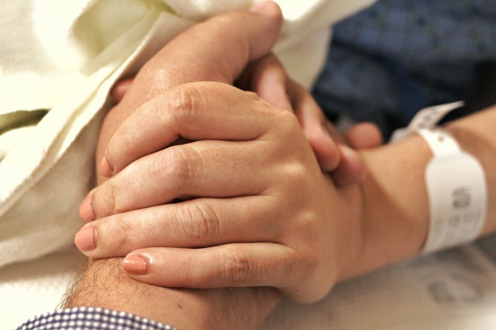 Hands hospital dying