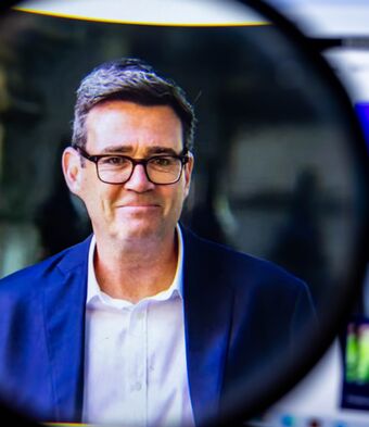 Andy Burnham magnifying glass