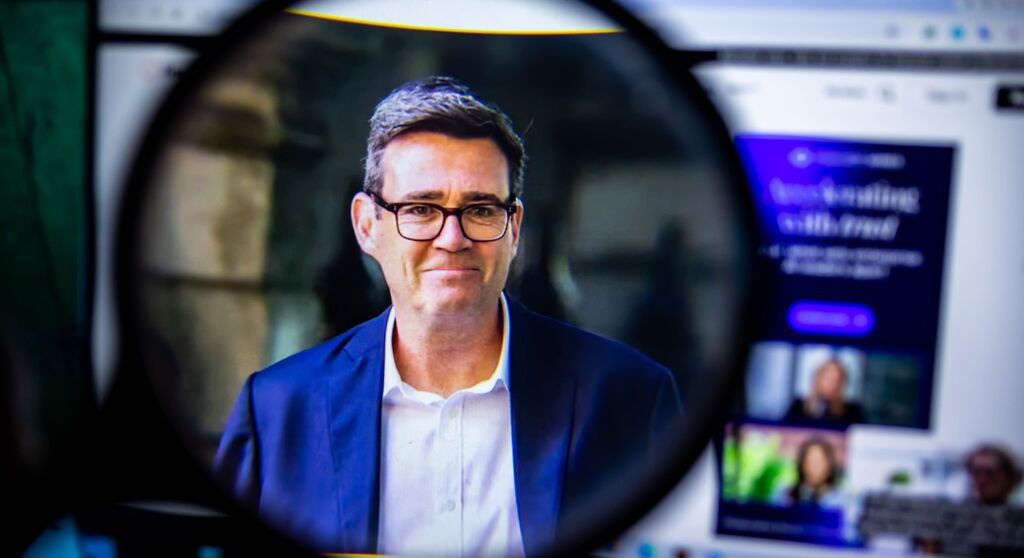 Andy Burnham magnifying glass