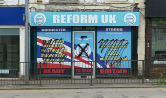Reform UK shop front grafitti
