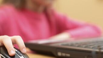 Child on computer istock 1 18